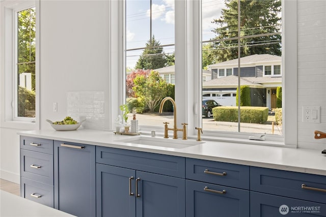 331 18th Ave, Kirkland, WA 98033 - kitchen with light countertops and blue cabinetry