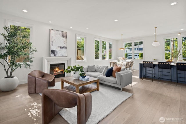 331 18th Ave, Kirkland, WA 98033 - living room featuring healthy amount of natural light, light wood finished floors, recessed lighting, and a fireplace