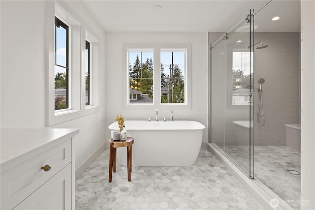 331 18th Ave, Kirkland, WA 98033 - full bath featuring plenty of natural light, a tile shower, a soaking tub, and recessed lighting
