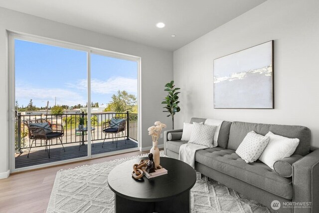 15726 40th Ave W Unit B3, Lynnwood, WA 98087 - living room featuring light wood-type flooring and recessed lighting