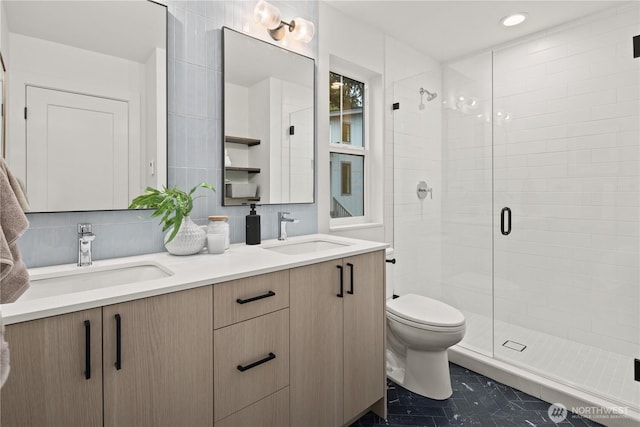 333 18th Ave, Kirkland, WA 98033 - full bath featuring a stall shower, double vanity, tile patterned floors, decorative backsplash, and recessed lighting