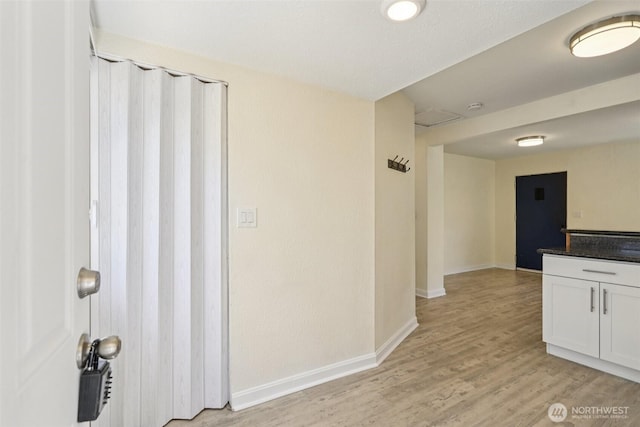 11303 Park Ave S, Tacoma, WA 98444 - empty room with light wood-style flooring and a smoke detector