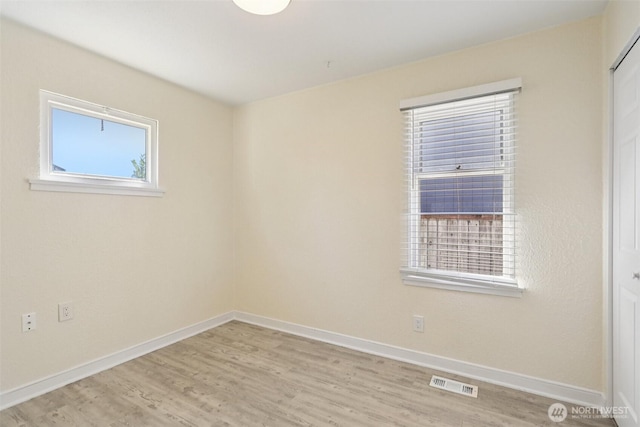 11303 Park Ave S, Tacoma, WA 98444 - spare room with light wood-style flooring