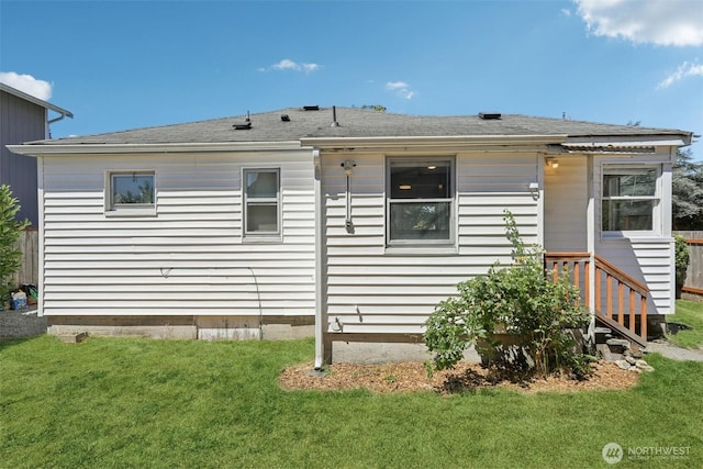 11303 Park Ave S, Tacoma, WA 98444 - rear view of house with a lawn and roof with shingles