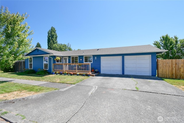 2102 35th Ave, Longview, WA 98632 - single story home with driveway, an attached garage, and covered porch