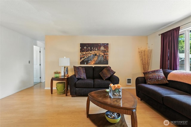 2102 35th Ave, Longview, WA 98632 - living area featuring light wood-style flooring and heating unit