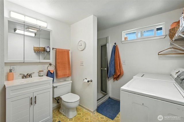 2102 35th Ave, Longview, WA 98632 - full bathroom with independent washer and dryer, vanity, and a stall shower