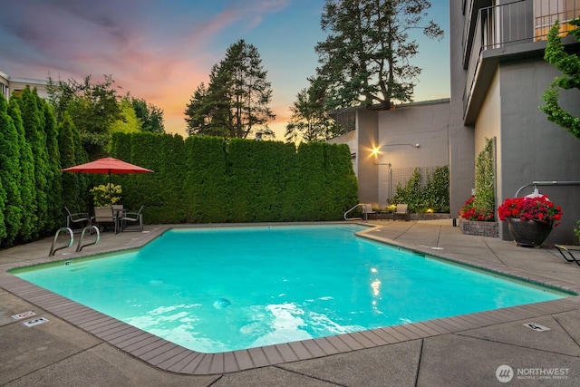1620 43rd Ave E Unit 15A-B, Seattle, WA 98112 - community pool featuring a patio