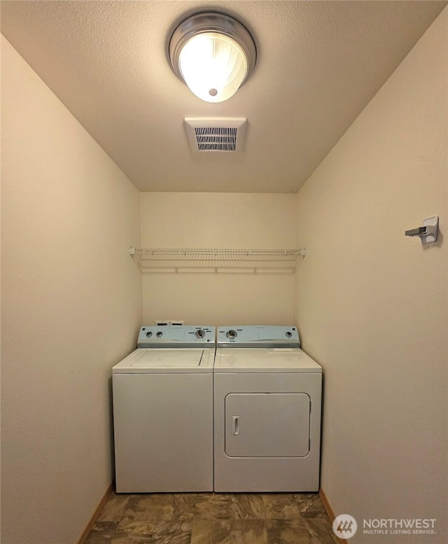 408 Eddy Ct, Port Townsend, WA 98368 - laundry area with washer and clothes dryer and baseboards