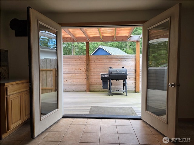 408 Eddy Ct, Port Townsend, WA 98368 - doorway with healthy amount of natural light and light tile patterned flooring