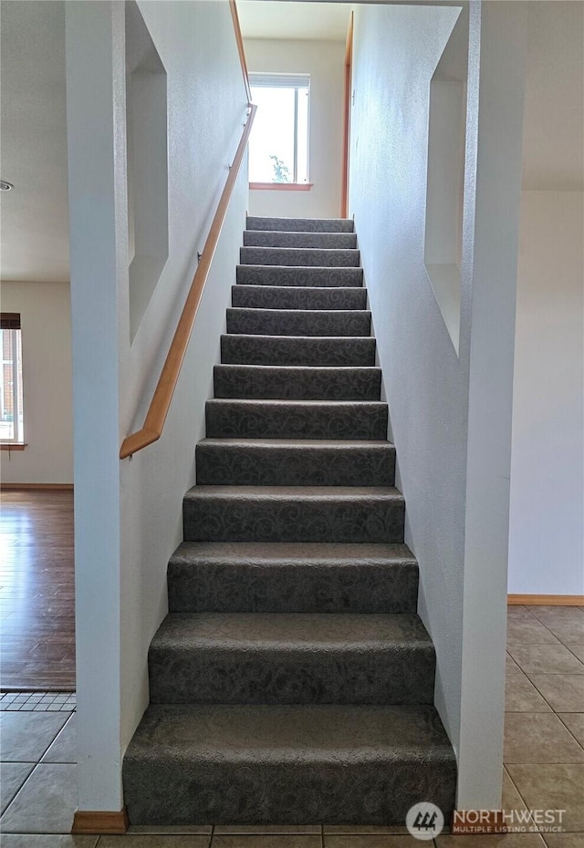 408 Eddy Ct, Port Townsend, WA 98368 - stairway featuring tile patterned floors