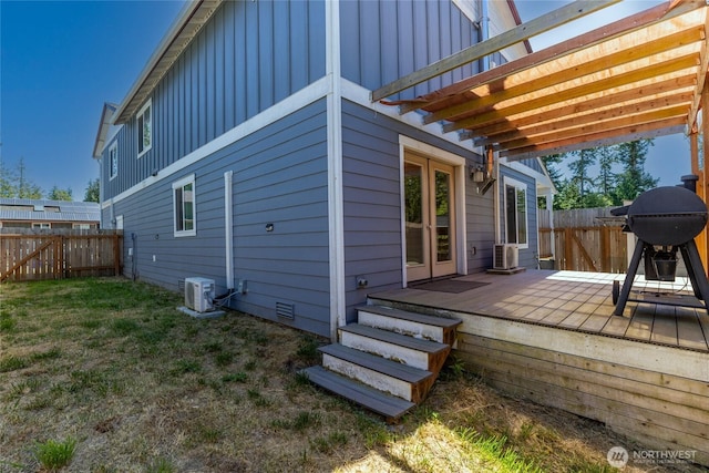 408 Eddy Ct, Port Townsend, WA 98368 - deck with a fenced backyard, a grill, and a pergola