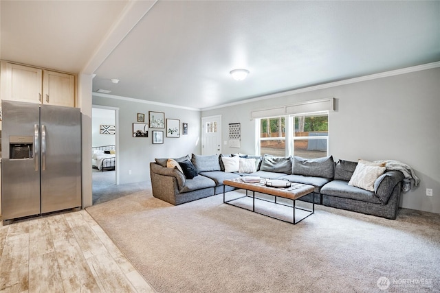 3563 Sweet Rd, Blaine, WA 98230 - living room featuring crown molding, light carpet, and light wood-style flooring