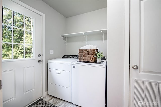 3563 Sweet Rd, Blaine, WA 98230 - washroom featuring washing machine and dryer and light wood-type flooring