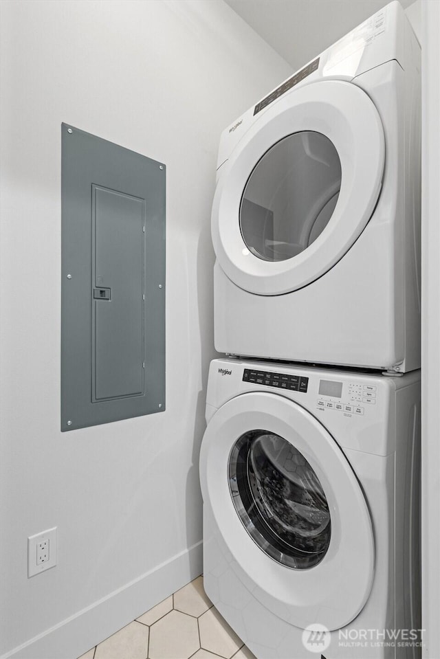 231 19th Ave, Kirkland, WA 98033 - washroom with stacked washer / drying machine, electric panel, and light tile patterned flooring