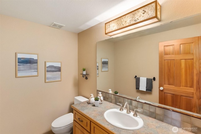 6701 Macintosh Ct SE, Olympia, WA 98513 - half bathroom with vanity and backsplash