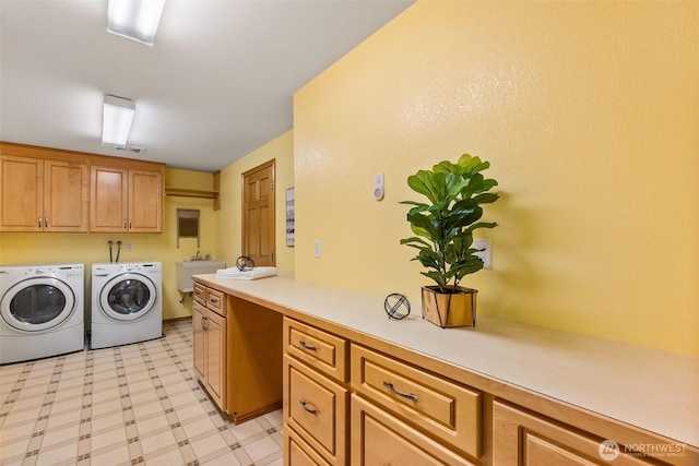 6701 Macintosh Ct SE, Olympia, WA 98513 - laundry area featuring independent washer and dryer, light floors, and cabinet space