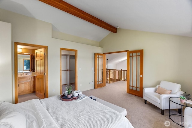 6701 Macintosh Ct SE, Olympia, WA 98513 - bedroom with light colored carpet, ensuite bath, and a walk in closet