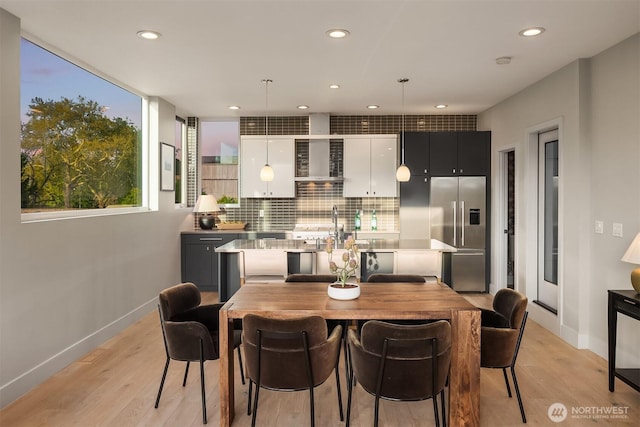 1629 42nd Ave E Unit B, Seattle, WA 98112 - dining area featuring light wood-style floors and recessed lighting