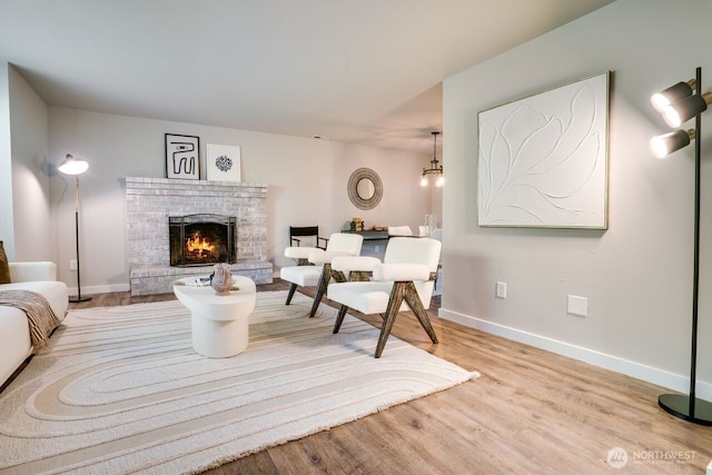 8106 186th Street Ct E, Puyallup, WA 98375 - living room with wood finished floors and a fireplace