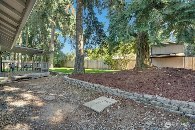8106 186th Street Ct E, Puyallup, WA 98375 - fenced backyard featuring a deck