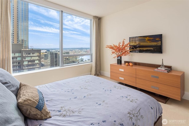 1521 2nd Ave Unit 2303, Seattle, WA 98101 - bedroom featuring carpet and baseboards