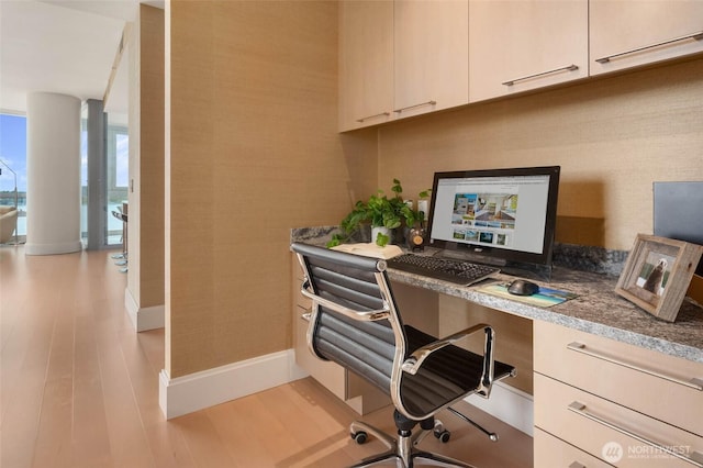 1521 2nd Ave Unit 2303, Seattle, WA 98101 - office featuring light wood-style floors and built in desk