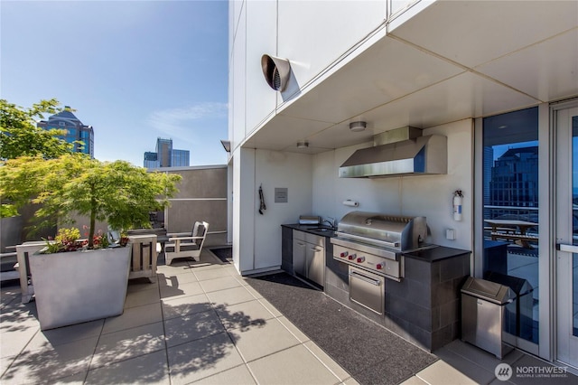 1521 2nd Ave Unit 2303, Seattle, WA 98101 - view of patio featuring exterior kitchen and a sink