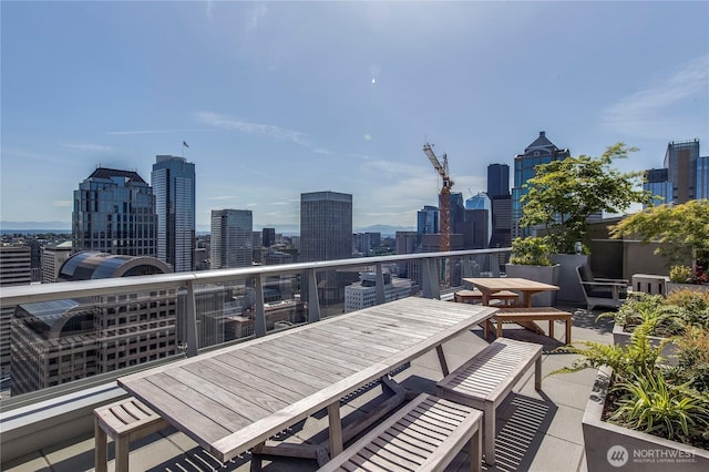 1521 2nd Ave Unit 2303, Seattle, WA 98101 - view of patio featuring a view of skyline