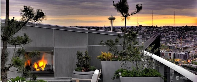 1521 2nd Ave Unit 2303, Seattle, WA 98101 - view of side of home with a lit fireplace