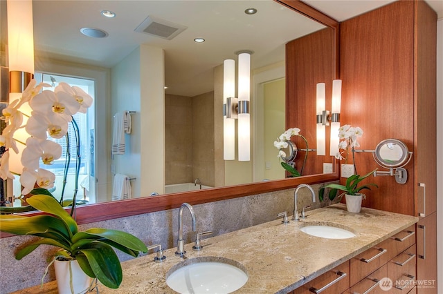 1521 2nd Ave Unit 2303, Seattle, WA 98101 - bathroom featuring tasteful backsplash and double vanity