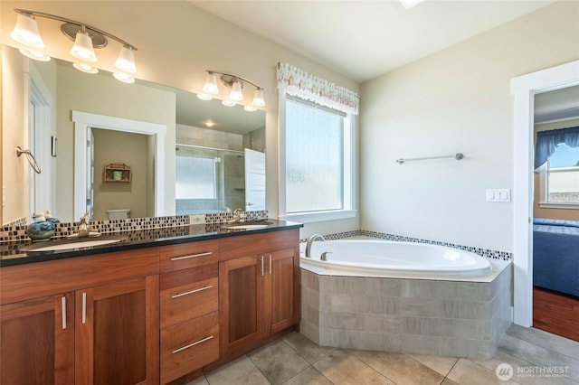 3516 Dianna Way, Wenatchee, WA 98801 - full bath with plenty of natural light, double vanity, tile patterned flooring, and a stall shower