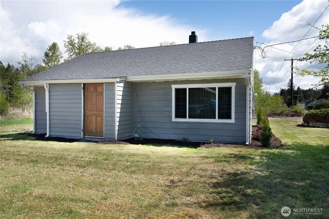 4476 Birch Bay Lynden Rd, Birch Bay, WA 98230 - view of front of home featuring a front yard, a chimney, and a shingled roof