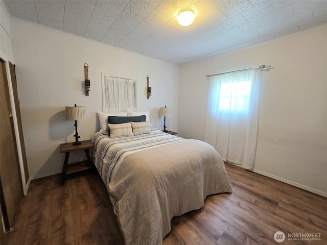 321 12th St, Raymond, WA 98577 - bedroom with wood finished floors and ornamental molding