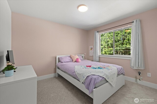 1427 114th Ave E, Edgewood, WA 98372 - bedroom with light carpet