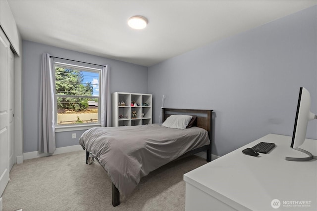 1427 114th Ave E, Edgewood, WA 98372 - bedroom with a closet and light colored carpet