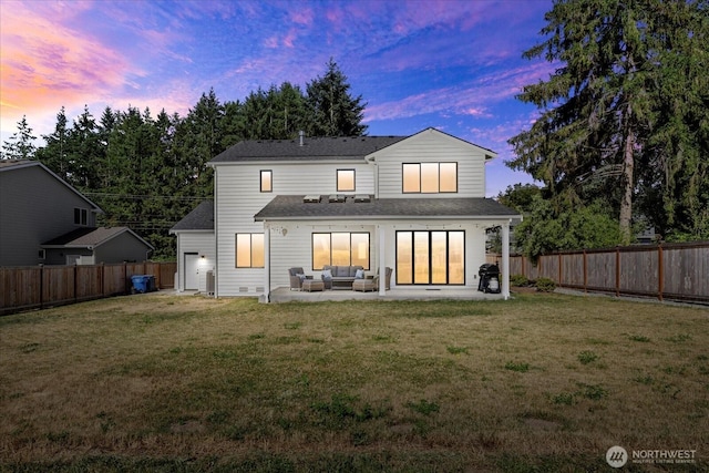 1427 114th Ave E, Edgewood, WA 98372 - back of house at dusk featuring outdoor lounge area, a patio area, a fenced backyard, and a shingled roof