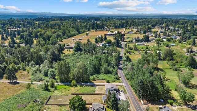 1427 114th Ave E, Edgewood, WA 98372 - aerial view of property and surrounding area with a forest