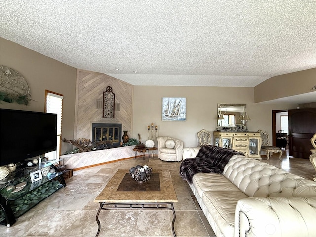 101 Sand Dune Ave NW, Ocean Shores, WA 98569 - living room with a large fireplace, a textured ceiling, and plenty of natural light