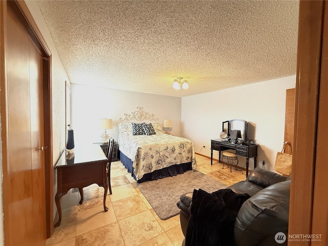 101 Sand Dune Ave NW, Ocean Shores, WA 98569 - bedroom with a textured ceiling