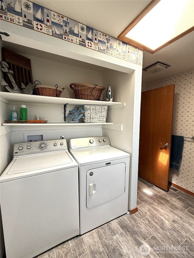 101 Sand Dune Ave NW, Ocean Shores, WA 98569 - laundry room with independent washer and dryer and wood tiled floors