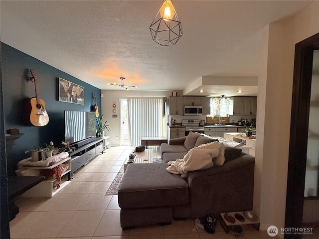 101 Sand Dune Ave NW, Ocean Shores, WA 98569 - living room featuring light tile patterned floors