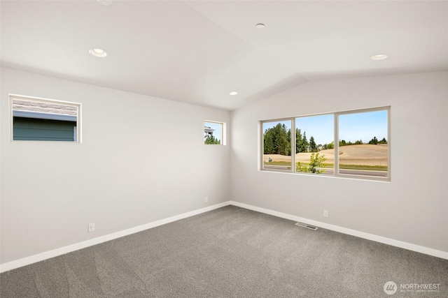 13931 178th St E Unit 39, Puyallup, WA 98374 - unfurnished room with lofted ceiling, recessed lighting, and dark carpet
