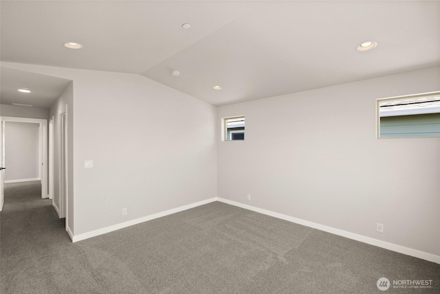 13931 178th St E Unit 39, Puyallup, WA 98374 - spare room with dark colored carpet, recessed lighting, and lofted ceiling