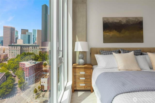 450 S Main St Unit 1608, Seattle, WA 98104 - bedroom with a skyline view