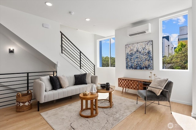 918 28th Ave S Unit B, Seattle, WA 98144 - living area with wood finished floors, recessed lighting, and a wall unit AC