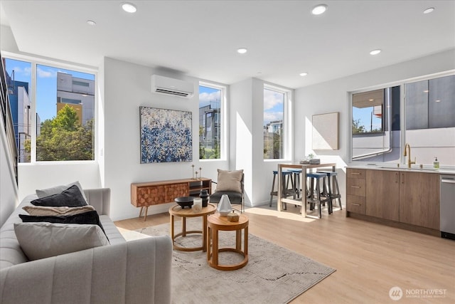 918 28th Ave S Unit B, Seattle, WA 98144 - living room with healthy amount of natural light, light wood-style flooring, recessed lighting, and a wall unit AC