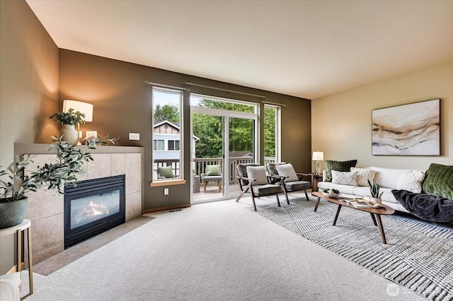 9411 18th Ave W Unit B, Everett, WA 98204 - living room with carpet floors and a tiled fireplace