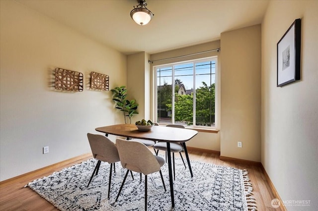 9411 18th Ave W Unit B, Everett, WA 98204 - dining room featuring wood finished floors and baseboards