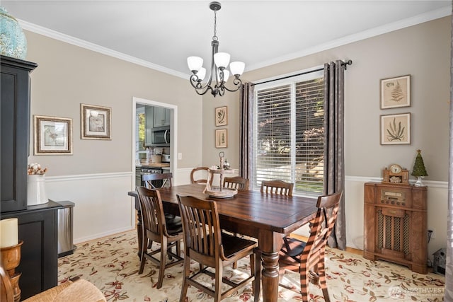 2060 Hammond Ave, Dupont, WA 98327 - dining space with a chandelier and ornamental molding